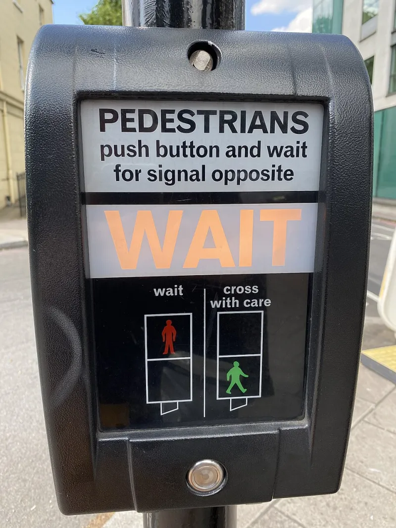 Seconds of Belonging: What Pedestrian Signal Timing Reveals About Whose Movement Cities Prioritize